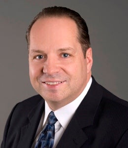 Portrait of Gerald Bourret, Associate.