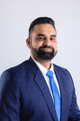 Portrait of Amarbir Gill, Associate.