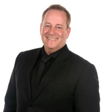 Portrait of Cordell Nielsen, Broker / Owner / Active REALTOR®.